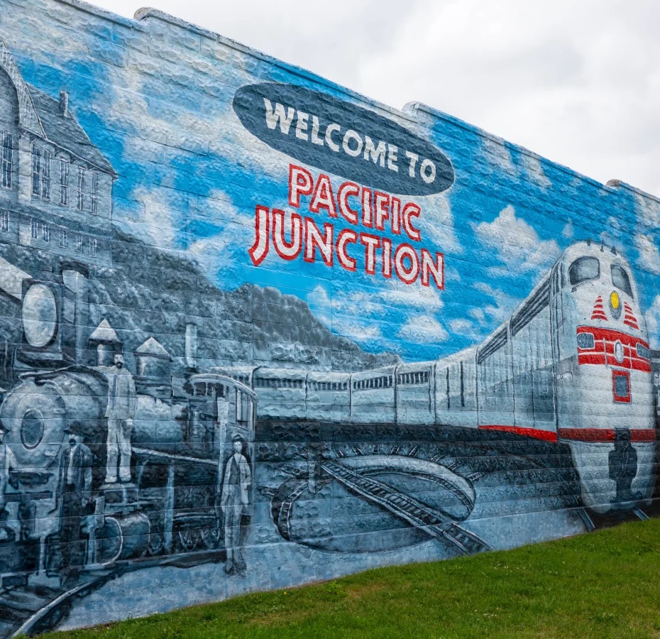 Welcome to Pacific Junction mural depicting the community’s railroad history